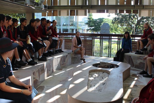 A school group visits the kuril dhagun talking circle