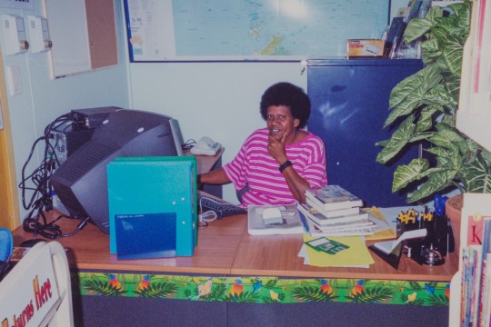Ruth Whap Library Administrator accessing the Aurora system at the newly opening Mabuiag IKC 2002 Photographer unknown 