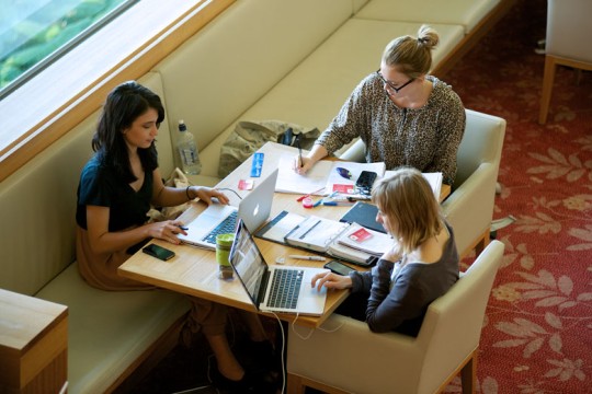 Women on laptops at the State Library