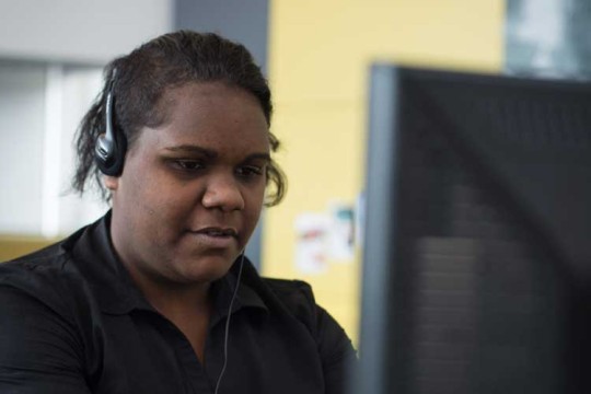 Woman using computer at the Caboolture public library