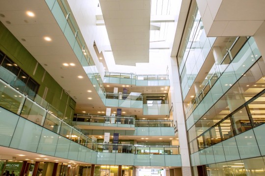 View from the ground floor up into the atrium in the State Library building.