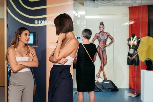 Two women talking in the Our Sporting Greats showcase