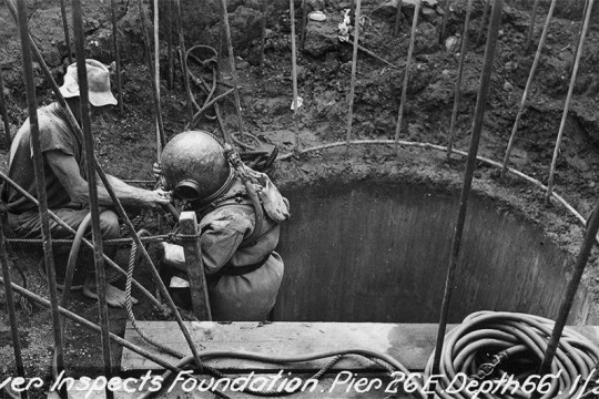 Diver inspects the foundation at Pier 26E, Story Bridge, Brisbane, 1936.