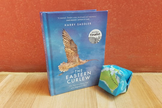 The Eastern Curley book with globe next to it