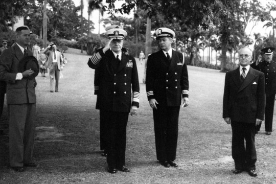 Black and white photograph of Fleet Admiral William T Halsey and Commander WJ Kitchell at the Coral Sea Service 