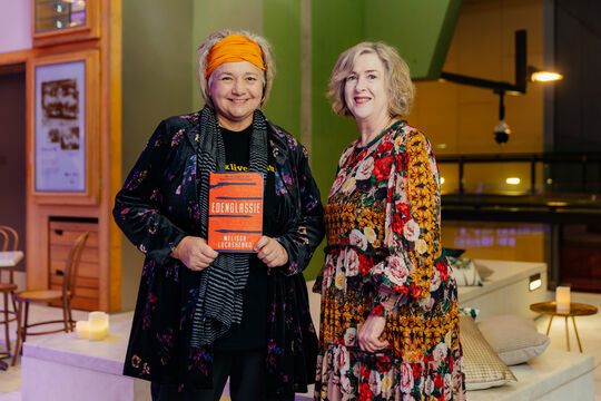 Melissa Lucashenko and Vicki McDonald with book Edenglassie