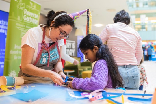 Woman and child crafing at State Library.