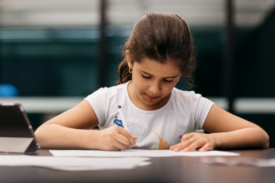 Girl writing workshop
