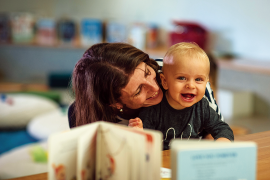Mum and baby reading