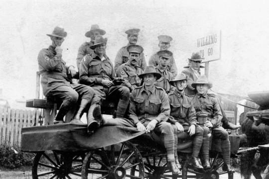 A group of soldiers on a cart