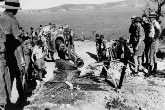 Coastal artillery gun being moved for mounting on the slopes of Paga Hill in Port Moresby, Papua New Guinea, World War II, ca. 1943