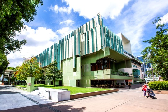 Exterior view of the State Library building during the day.
