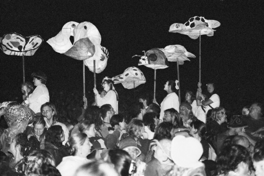 Assembling with paper lanterns to join in the evening parade and celebration