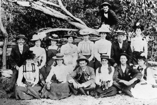 Black and white group image of Woodford residents, the Beanland family