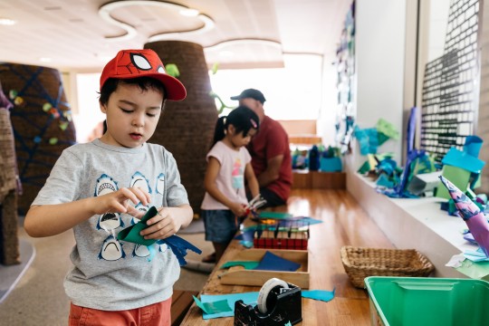 Boy playing with craft