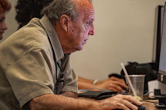 Older person using a computer at Cairns Public Library 