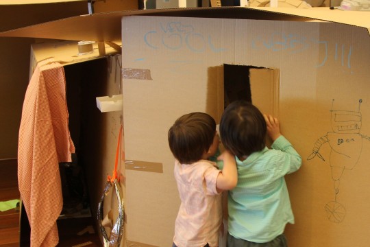 Children inspecting the cardboard fort during Fun palace