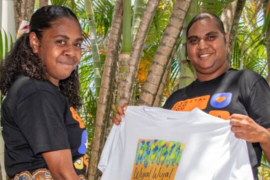 IKC Coordinators with T-shirts they designed and printed during a Digital and You Digital Arts Workshop.