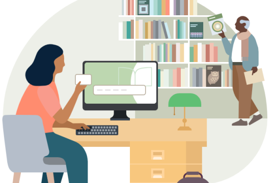Image of a person using compute and another person taking a book off the shelf