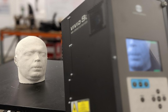 plaster human head being 3D scanned using a Vivid i9 Laser Scanner