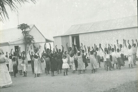 Children in the playground of the school on Mabuiag Island, Queensland