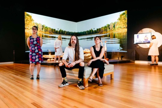 People viewing the Spoken exhibition in slq Gallery