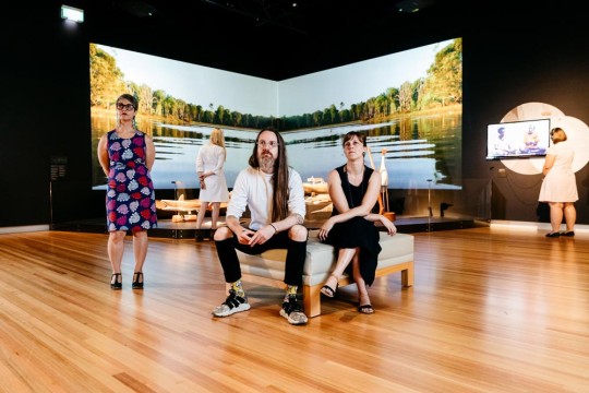 People exploring the Spoken exhibition at State Library