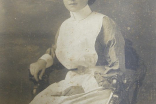Portrait of a young Constance Keys sitting on a chair