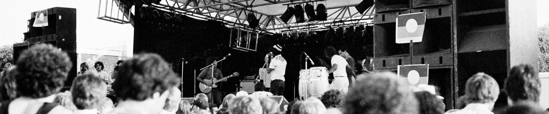Rock against racism concert Band playing on stage to crowd