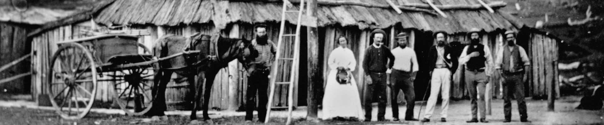 Black white photo of a bridal party in front of Martin Dwyers Rock of Cashel Hotel at the Thirteen Mile Creek Sugerloaf 1873