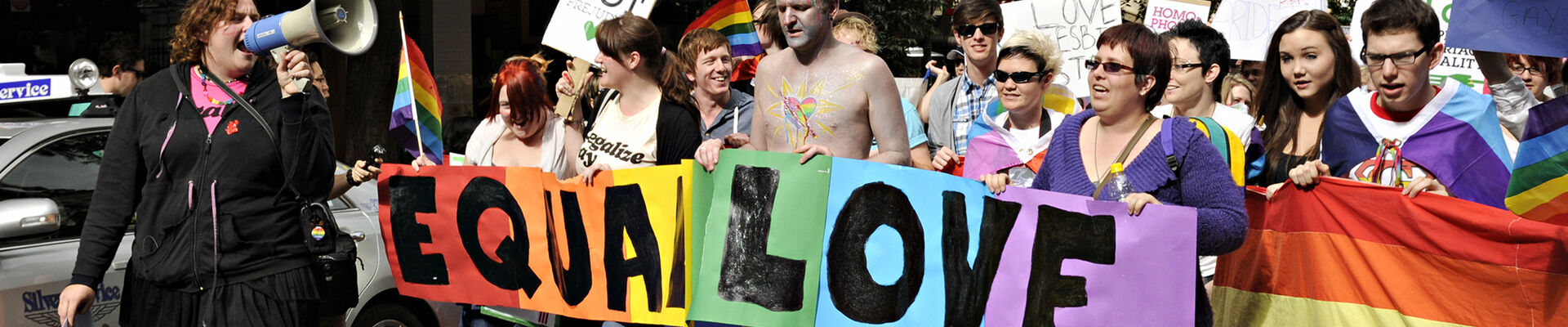 Woman with megaphone during march at Marriage Equality Rally in Brisbane 2011