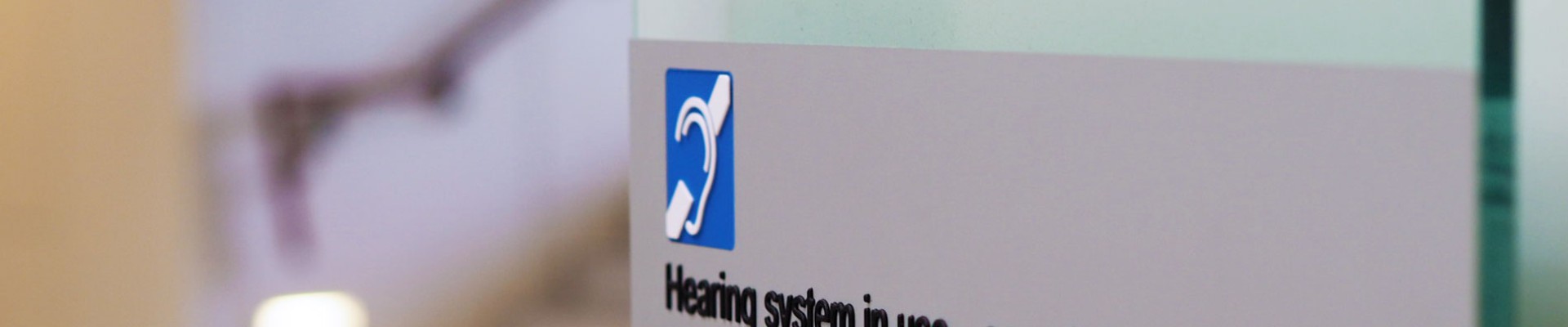 Hearing system signage at the State Library Photo by Emma Winch