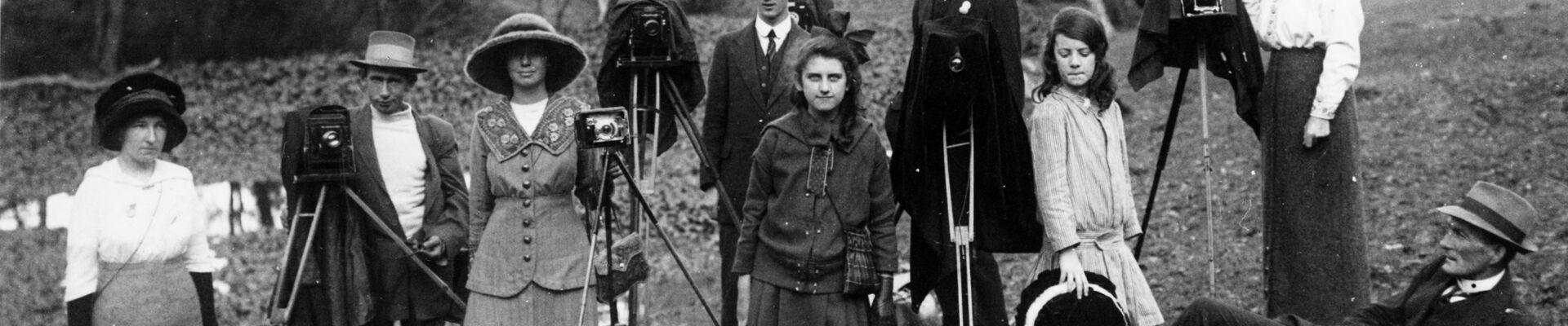 Group of men and women photographed with their cameras possibly in the Redcliffe area 1910-1920