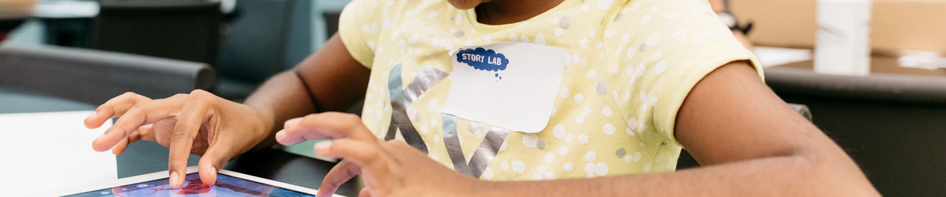 Child participating in Movie Bot workshop