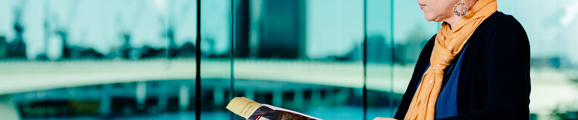 Person reading in the State Library of Queensland