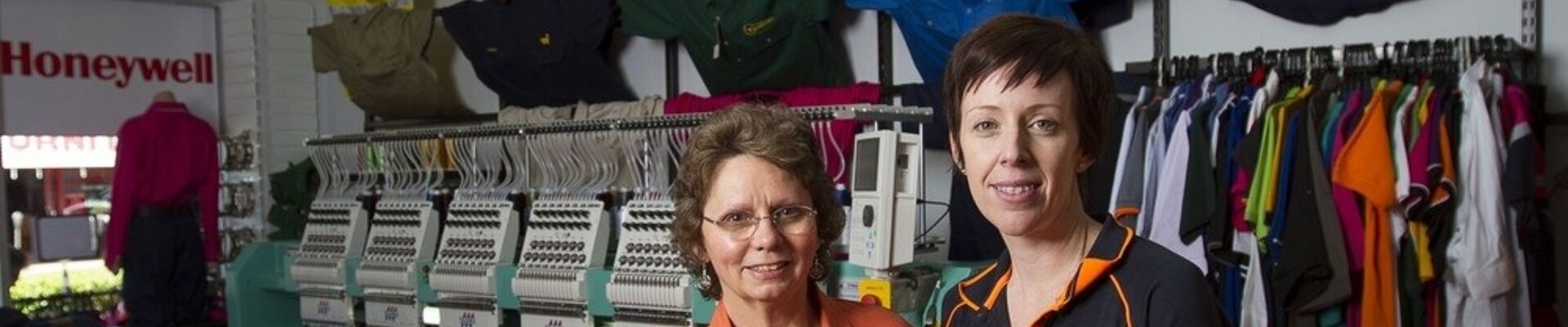 A store and the shopkeeping staff photographed in the town of Dalby for the Queensland Small Towns project