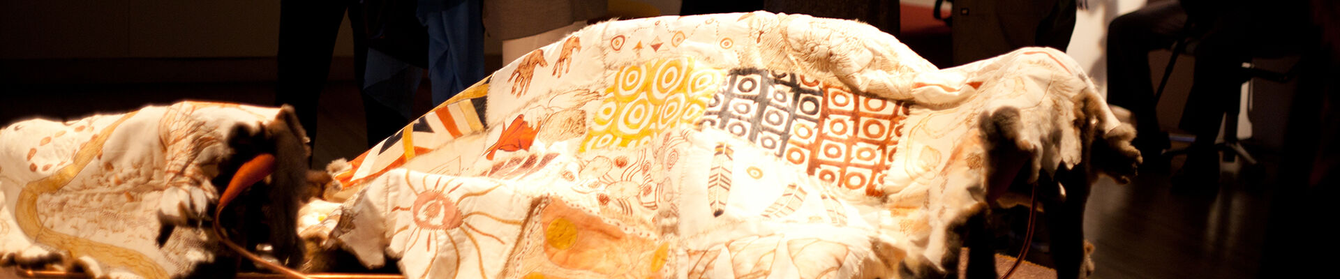 Display of a possum skin cloak at the Art of the Skins exhibition