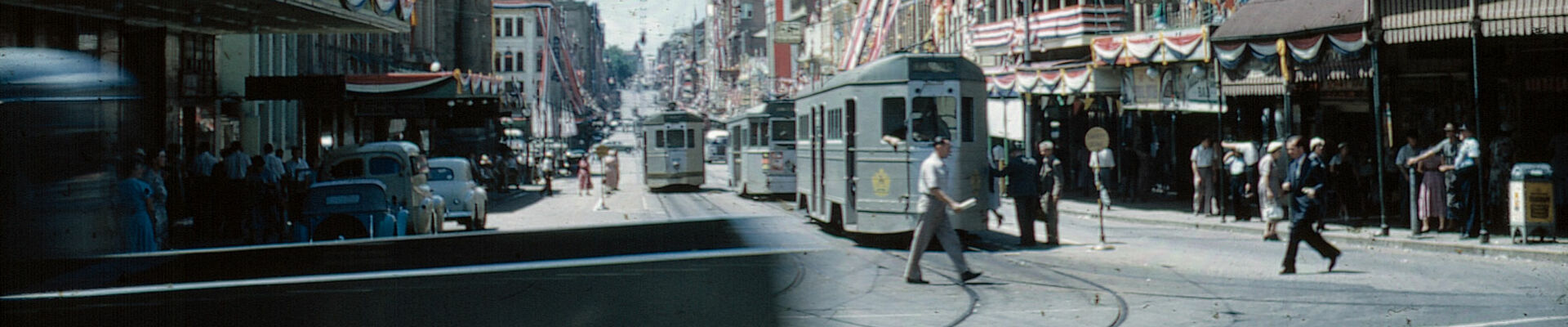 View along Adelaide Street from George Street with the buildings decorated for the Royal Visit, 1954 View along Adelaide Street from George Street with the buildings decorated for the Royal Visit 1954