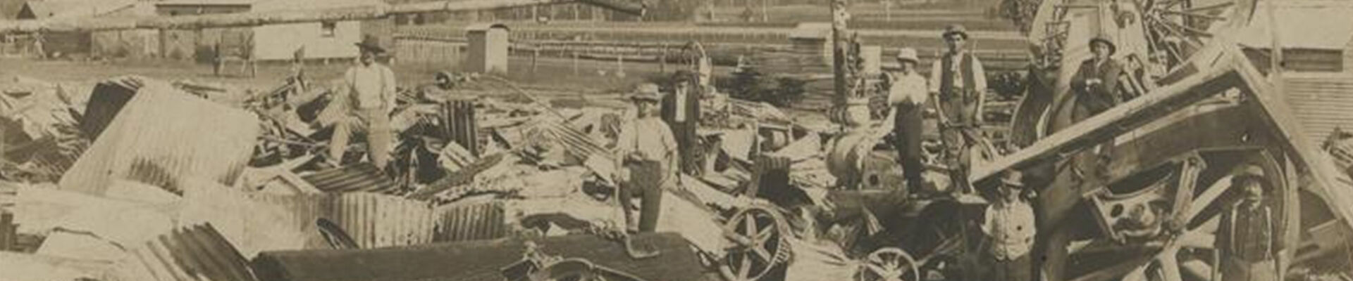 Effects of fire at McIntosh & Dumigan Sawmill, 1912 Charred building materials and the remnants of boilers and machinery from the Killarney Sawmill