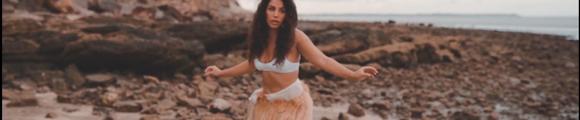 Keely Eggmolesse on a beach
