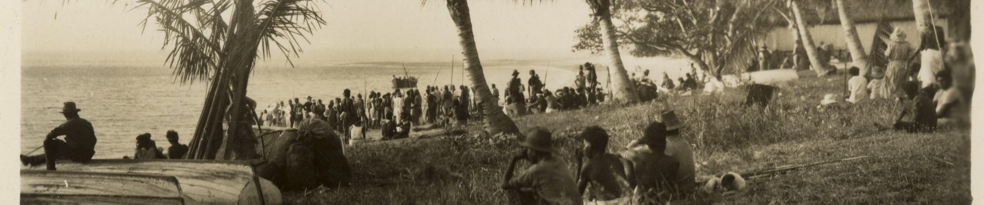 Crowds gathered on the beach at Palm Island Queensland