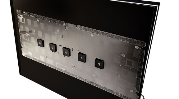 A close up photo of a recycled Artist book created using electronic parts by Suzon Fuks
