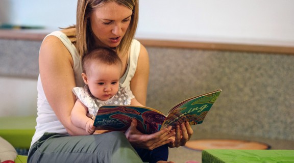 Woman reading to a child