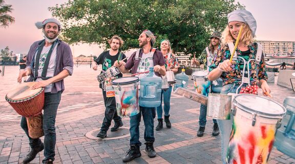 Roving percussion group with recycled instruments