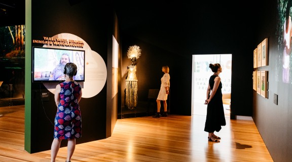 People looking at the Spoken exhibition
