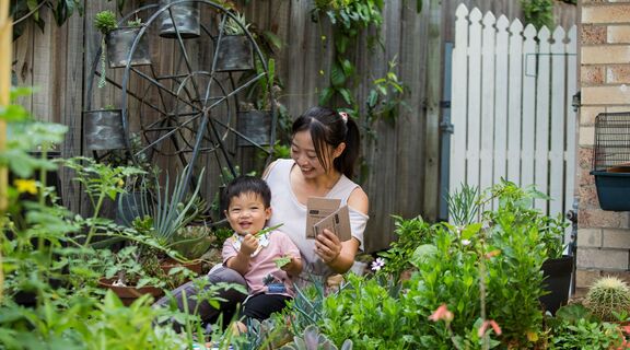 Mother and son in garden together