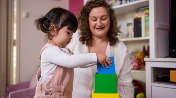 Toddler playing with blocks