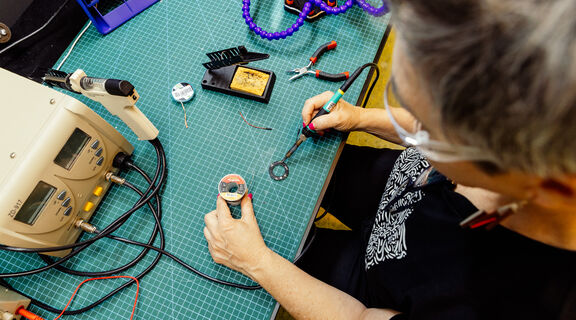 Person soldering
