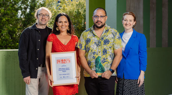 2024 John Oxley Library Community History Award recipient, Pama Language Centre. Representatives Joshua McHugh, Tarmara Pearson and Xavier Barker with Manager Queensland Library Foundation, Anna Herbert.