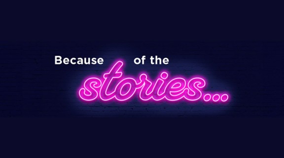 Pink neon graphic that says "Because of the stories".
